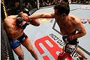 STOCKHOLM, SWEDEN - APRIL 06:  (R-L) Gegard Mousasi punches Ilir Latifi in their light heavyweight fight at the Ericsson Globe Arena on April 6, 2013 in Stockholm, Sweden.  (Photo by Josh Hedges/Zuffa LLC/Zuffa LLC via Getty Images)