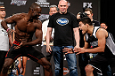 LAS VEGAS, NV - APRIL 12: (L-R) Opponents Uriah Hall and Kelvin Gastelum face off during the TUF 17 Finale weigh-in at the Hollywood Theatre at the MGM Grand Hotel/Casino on April 12, 2013 in Las Vegas, Nevada. (Photo by Josh Hedges/Zuffa LLC/Zuffa LLC via Getty Images)