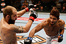 LAS VEGAS, NV - APRIL 13:   (R-L) Maximo Blanco punches Sam Sicilia in their featherweight fight at the Mandalay Bay Events Center  on April 13, 2013 in Las Vegas, Nevada.  (Photo by Josh Hedges/Zuffa LLC/Zuffa LLC via Getty Images)  *** Local Caption *** Maximo Blanco; Sam Sicilia