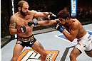 LAS VEGAS, NV - APRIL 13:   (R-L) Maximo Blanco punches Sam Sicilia in their featherweight fight at the Mandalay Bay Events Center  on April 13, 2013 in Las Vegas, Nevada.  (Photo by Josh Hedges/Zuffa LLC/Zuffa LLC via Getty Images)  *** Local Caption *** Maximo Blanco; Sam Sicilia