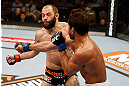 LAS VEGAS, NV - APRIL 13:   (R-L) Maximo Blanco punches Sam Sicilia in their featherweight fight at the Mandalay Bay Events Center  on April 13, 2013 in Las Vegas, Nevada.  (Photo by Josh Hedges/Zuffa LLC/Zuffa LLC via Getty Images)  *** Local Caption *** Maximo Blanco; Sam Sicilia