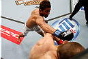 LAS VEGAS, NV - APRIL 13:   (L-R) Maximo Blanco punches Sam Sicilia in their featherweight fight at the Mandalay Bay Events Center  on April 13, 2013 in Las Vegas, Nevada.  (Photo by Josh Hedges/Zuffa LLC/Zuffa LLC via Getty Images)  *** Local Caption *** Maximo Blanco; Sam Sicilia