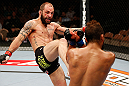 LAS VEGAS, NV - APRIL 13:   (L-R) Sam Sicilia kicks Maximo Blanco in their featherweight fight at the Mandalay Bay Events Center  on April 13, 2013 in Las Vegas, Nevada.  (Photo by Josh Hedges/Zuffa LLC/Zuffa LLC via Getty Images)  *** Local Caption *** Maximo Blanco; Sam Sicilia