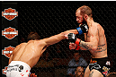 LAS VEGAS, NV - APRIL 13:   (L-R) Maximo Blanco punches Sam Sicilia in their featherweight fight at the Mandalay Bay Events Center  on April 13, 2013 in Las Vegas, Nevada.  (Photo by Josh Hedges/Zuffa LLC/Zuffa LLC via Getty Images)  *** Local Caption *** Maximo Blanco; Sam Sicilia