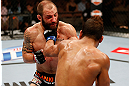 LAS VEGAS, NV - APRIL 13:   (R-L) Maximo Blanco punches Sam Sicilia in their featherweight fight at the Mandalay Bay Events Center  on April 13, 2013 in Las Vegas, Nevada.  (Photo by Josh Hedges/Zuffa LLC/Zuffa LLC via Getty Images)  *** Local Caption *** Maximo Blanco; Sam Sicilia