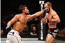 LAS VEGAS, NV - APRIL 13:   (L-R) Maximo Blanco punches Sam Sicilia in their featherweight fight at the Mandalay Bay Events Center  on April 13, 2013 in Las Vegas, Nevada.  (Photo by Josh Hedges/Zuffa LLC/Zuffa LLC via Getty Images)  *** Local Caption *** Maximo Blanco; Sam Sicilia