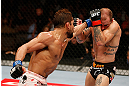 LAS VEGAS, NV - APRIL 13:   (L-R) Maximo Blanco punches Sam Sicilia in their featherweight fight at the Mandalay Bay Events Center  on April 13, 2013 in Las Vegas, Nevada.  (Photo by Josh Hedges/Zuffa LLC/Zuffa LLC via Getty Images)  *** Local Caption *** Maximo Blanco; Sam Sicilia