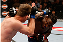 LAS VEGAS, NV - APRIL 13:   (R-L) Clint Hester punches Bristol Marunde in their middleweight fight at the Mandalay Bay Events Center  on April 13, 2013 in Las Vegas, Nevada.  (Photo by Josh Hedges/Zuffa LLC/Zuffa LLC via Getty Images)  *** Local Caption *** Clint Hester; Bristol Marunde