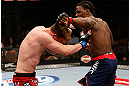 LAS VEGAS, NV - APRIL 13:   (R-L) Clint Hester punches Bristol Marunde in their middleweight fight at the Mandalay Bay Events Center  on April 13, 2013 in Las Vegas, Nevada.  (Photo by Josh Hedges/Zuffa LLC/Zuffa LLC via Getty Images)  *** Local Caption *** Clint Hester; Bristol Marunde