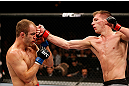 LAS VEGAS, NV - APRIL 13:   (R-L) Luke Barnatt punches Collin Hart in their middleweight fight at the Mandalay Bay Events Center  on April 13, 2013 in Las Vegas, Nevada.  (Photo by Josh Hedges/Zuffa LLC/Zuffa LLC via Getty Images)  *** Local Caption *** Luke Barnatt; Collin Hart