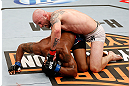 LAS VEGAS, NV - APRIL 13:   Robert McDaniel (top) punches Gilbert Smith in their middleweight fight at the Mandalay Bay Events Center  on April 13, 2013 in Las Vegas, Nevada.  (Photo by Josh Hedges/Zuffa LLC/Zuffa LLC via Getty Images)  *** Local Caption *** Robert McDaniel; Gilbert Smith
