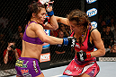LAS VEGAS, NV - APRIL 13:   (R-L) Miesha Tate punches Cat Zingano in their bantamweight fight at the Mandalay Bay Events Center  on April 13, 2013 in Las Vegas, Nevada.  (Photo by Josh Hedges/Zuffa LLC/Zuffa LLC via Getty Images)  *** Local Caption *** Miesha Tate; Cat Zingano