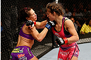 LAS VEGAS, NV - APRIL 13:   (R-L) Miesha Tate punches Cat Zingano in their bantamweight fight at the Mandalay Bay Events Center  on April 13, 2013 in Las Vegas, Nevada.  (Photo by Josh Hedges/Zuffa LLC/Zuffa LLC via Getty Images)  *** Local Caption *** Miesha Tate; Cat Zingano