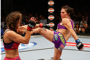 LAS VEGAS, NV - APRIL 13:   (R-L) Cat Zingano kicks Miesha Tate in their bantamweight fight at the Mandalay Bay Events Center  on April 13, 2013 in Las Vegas, Nevada.  (Photo by Josh Hedges/Zuffa LLC/Zuffa LLC via Getty Images)  *** Local Caption *** Miesha Tate; Cat Zingano