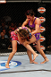 LAS VEGAS, NV - APRIL 13:   Cat Zingano (right) knees Miesha Tate in their bantamweight fight at the Mandalay Bay Events Center  on April 13, 2013 in Las Vegas, Nevada.  (Photo by Josh Hedges/Zuffa LLC/Zuffa LLC via Getty Images)  *** Local Caption *** Miesha Tate; Cat Zingano
