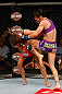 LAS VEGAS, NV - APRIL 13:   Cat Zingano (right) knees Miesha Tate in their bantamweight fight at the Mandalay Bay Events Center  on April 13, 2013 in Las Vegas, Nevada.  (Photo by Josh Hedges/Zuffa LLC/Zuffa LLC via Getty Images)  *** Local Caption *** Miesha Tate; Cat Zingano