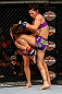 LAS VEGAS, NV - APRIL 13:   Cat Zingano (right) knees Miesha Tate in their bantamweight fight at the Mandalay Bay Events Center  on April 13, 2013 in Las Vegas, Nevada.  (Photo by Josh Hedges/Zuffa LLC/Zuffa LLC via Getty Images)  *** Local Caption *** Miesha Tate; Cat Zingano