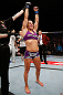 LAS VEGAS, NV - APRIL 13:   Cat Zingano reacts to her victory over Miesha Tate in their bantamweight fight at the Mandalay Bay Events Center  on April 13, 2013 in Las Vegas, Nevada.  (Photo by Josh Hedges/Zuffa LLC/Zuffa LLC via Getty Images)  *** Local Caption *** Miesha Tate; Cat Zingano