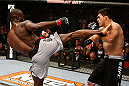 LAS VEGAS, NV - APRIL 13:   (L-R) Uriah Hall kicks Kelvin Gastelum in their middleweight fight at the Mandalay Bay Events Center  on April 13, 2013 in Las Vegas, Nevada.  (Photo by Josh Hedges/Zuffa LLC/Zuffa LLC via Getty Images)  *** Local Caption *** Uriah Hall; Kelvin Gastelum