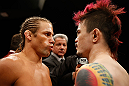 LAS VEGAS, NV - APRIL 13:   (L-R) Urijah Faber and Scott Jorgensen face off before their bantamweight fight at the Mandalay Bay Events Center  on April 13, 2013 in Las Vegas, Nevada.  (Photo by Josh Hedges/Zuffa LLC/Zuffa LLC via Getty Images)  *** Local Caption *** Urijah Faber; Scott Jorgensen
