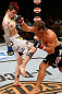 LAS VEGAS, NV - APRIL 13:   (R-L) Urijah Faber punches Scott Jorgensen in their bantamweight fight at the Mandalay Bay Events Center  on April 13, 2013 in Las Vegas, Nevada.  (Photo by Josh Hedges/Zuffa LLC/Zuffa LLC via Getty Images)  *** Local Caption *** Urijah Faber; Scott Jorgensen
