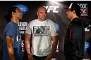 SAN JOSE, CA - APRIL 18:   (L-R) Opponents Benson Henderson and Gilbert Melendez face off during media day ahead of the UFC on FOX event at HP Pavilion on April 18, 2013 in San Jose, California.  (Photo by Josh Hedges/Zuffa LLC/Zuffa LLC via Getty Images)
