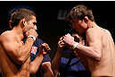 SAN JOSE, CA - APRIL 19:   (L-R) Opponents Chad Mendes and Darren Elkins face off during the UFC on FOX weigh-in at the California Theatre on April 19, 2013 in San Jose, California.  (Photo by Josh Hedges/Zuffa LLC/Zuffa LLC via Getty Images)