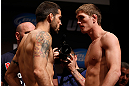 SAN JOSE, CA - APRIL 19:   (L-R) Opponents Matt Brown and Jordan Mein face off during the UFC on FOX weigh-in at the California Theatre on April 19, 2013 in San Jose, California.  (Photo by Josh Hedges/Zuffa LLC/Zuffa LLC via Getty Images)