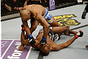 SAN JOSE, CA - APRIL 20:   Yoel Romero (top) punches Clifford Starks in their middleweight bout during the UFC on FOX event at the HP Pavilion on April 20, 2013 in San Jose, California.  (Photo by Ezra Shaw/Zuffa LLC/Zuffa LLC via Getty Images)  *** Local Caption *** Clifford Starks; Yoel Romero
