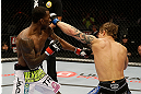 SAN JOSE, CA - APRIL 20:   (R-L) Roger Bowling punches Anthony Njokuani in their lightweight bout during the UFC on FOX event at the HP Pavilion on April 20, 2013 in San Jose, California.  (Photo by Ezra Shaw/Zuffa LLC/Zuffa LLC via Getty Images)  *** Local Caption *** Anthony Njokuani; Roger Bowling