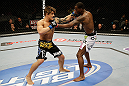 SAN JOSE, CA - APRIL 20:   (L-R) Roger Bowling punches Anthony Njokuani in their lightweight bout during the UFC on FOX event at the HP Pavilion on April 20, 2013 in San Jose, California.  (Photo by Ezra Shaw/Zuffa LLC/Zuffa LLC via Getty Images)  *** Local Caption *** Anthony Njokuani; Roger Bowling