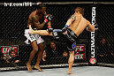 SAN JOSE, CA - APRIL 20:   (R-L) Roger Bowling kicks Anthony Njokuani in their lightweight bout during the UFC on FOX event at the HP Pavilion on April 20, 2013 in San Jose, California.  (Photo by Ezra Shaw/Zuffa LLC/Zuffa LLC via Getty Images)  *** Local Caption *** Anthony Njokuani; Roger Bowling