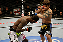 SAN JOSE, CA - APRIL 20:   (L-R) Anthony Njokuani punches Roger Bowling in their lightweight bout during the UFC on FOX event at the HP Pavilion on April 20, 2013 in San Jose, California.  (Photo by Ezra Shaw/Zuffa LLC/Zuffa LLC via Getty Images)  *** Local Caption *** Anthony Njokuani; Roger Bowling