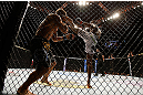 SAN JOSE, CA - APRIL 20:   (R-L) Anthony Njokuani kicks Roger Bowling in their lightweight bout during the UFC on FOX event during the UFC on FOX event at the HP Pavilion on April 20, 2013 in San Jose, California.  (Photo by Josh Hedges/Zuffa LLC/Zuffa LLC via Getty Images)  *** Local Caption *** Anthony Njokuani; Roger Bowling