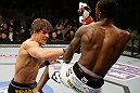 SAN JOSE, CA - APRIL 20:   (L-R) Roger Bowling punches Anthony Njokuani in their lightweight bout during the UFC on FOX event at the HP Pavilion on April 20, 2013 in San Jose, California.  (Photo by Ezra Shaw/Zuffa LLC/Zuffa LLC via Getty Images)  *** Local Caption *** Anthony Njokuani; Roger Bowling
