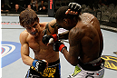 SAN JOSE, CA - APRIL 20:   (L-R) Roger Bowling punches Anthony Njokuani in their lightweight bout during the UFC on FOX event at the HP Pavilion on April 20, 2013 in San Jose, California.  (Photo by Ezra Shaw/Zuffa LLC/Zuffa LLC via Getty Images)  *** Local Caption *** Anthony Njokuani; Roger Bowling