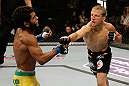 SAN JOSE, CA - APRIL 20:   (R-L) T.J. Dillashaw punches Hugo Viana in their bantamweight bout during the UFC on FOX event at the HP Pavilion on April 20, 2013 in San Jose, California.  (Photo by Ezra Shaw/Zuffa LLC/Zuffa LLC via Getty Images)  *** Local Caption *** T.J. Dillashaw; Hugo Viana