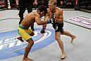 SAN JOSE, CA - APRIL 20:   (R-L) T.J. Dillashaw punches Hugo Viana in their bantamweight bout during the UFC on FOX event at the HP Pavilion on April 20, 2013 in San Jose, California.  (Photo by Ezra Shaw/Zuffa LLC/Zuffa LLC via Getty Images)  *** Local Caption *** T.J. Dillashaw; Hugo Viana