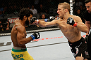 SAN JOSE, CA - APRIL 20:   (R-L) T.J. Dillashaw punches Hugo Viana in their bantamweight bout during the UFC on FOX event at the HP Pavilion on April 20, 2013 in San Jose, California.  (Photo by Ezra Shaw/Zuffa LLC/Zuffa LLC via Getty Images)  *** Local Caption *** T.J. Dillashaw; Hugo Viana