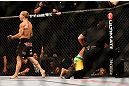 SAN JOSE, CA - APRIL 20:   T.J. Dillashaw (left) reacts to his victory over Hugo Viana in their bantamweight bout during the UFC on FOX event during the UFC on FOX event at the HP Pavilion on April 20, 2013 in San Jose, California.  (Photo by Josh Hedges/Zuffa LLC/Zuffa LLC via Getty Images)  *** Local Caption *** T.J. Dillashaw; Hugo Viana