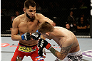 SAN JOSE, CA - APRIL 20:   (L-R) Jorge Masvidal punches Tim Means in their lightweight bout during the UFC on FOX event at the HP Pavilion on April 20, 2013 in San Jose, California.  (Photo by Ezra Shaw/Zuffa LLC/Zuffa LLC via Getty Images)  *** Local Caption *** Tim Means; Jorge Masvidal
