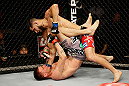 SAN JOSE, CA - APRIL 20:   Jorge Masvidal (top) punches Tim Means in their lightweight bout during the UFC on FOX event at the HP Pavilion on April 20, 2013 in San Jose, California.  (Photo by Ezra Shaw/Zuffa LLC/Zuffa LLC via Getty Images)  *** Local Caption *** Tim Means; Jorge Masvidal