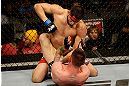 SAN JOSE, CA - APRIL 20:   Jorge Masvidal (top) punches Tim Means in their lightweight bout during the UFC on FOX event at the HP Pavilion on April 20, 2013 in San Jose, California.  (Photo by Ezra Shaw/Zuffa LLC/Zuffa LLC via Getty Images)  *** Local Caption *** Tim Means; Jorge Masvidal