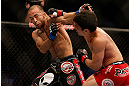SAN JOSE, CA - APRIL 20:   (R-L) Joseph Benavidez punches Darren Uyenoyama in their flyweight bout during the UFC on FOX event during the UFC on FOX event at the HP Pavilion on April 20, 2013 in San Jose, California.  (Photo by Josh Hedges/Zuffa LLC/Zuffa LLC via Getty Images)  *** Local Caption *** Joseph Benavidez; Darren Uyenoyama