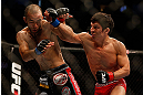 SAN JOSE, CA - APRIL 20:   (R-L) Joseph Benavidez punches Darren Uyenoyama in their flyweight bout during the UFC on FOX event during the UFC on FOX event at the HP Pavilion on April 20, 2013 in San Jose, California.  (Photo by Josh Hedges/Zuffa LLC/Zuffa LLC via Getty Images)  *** Local Caption *** Joseph Benavidez; Darren Uyenoyama