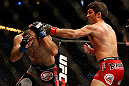 SAN JOSE, CA - APRIL 20:   (R-L) Joseph Benavidez punches Darren Uyenoyama in their flyweight bout during the UFC on FOX event during the UFC on FOX event at the HP Pavilion on April 20, 2013 in San Jose, California.  (Photo by Josh Hedges/Zuffa LLC/Zuffa LLC via Getty Images)  *** Local Caption *** Joseph Benavidez; Darren Uyenoyama