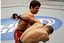 SAN JOSE, CA - APRIL 20:   Joseph Benavidez (top) punches Darren Uyenoyama in their flyweight bout during the UFC on FOX event at the HP Pavilion on April 20, 2013 in San Jose, California.  (Photo by Ezra Shaw/Zuffa LLC/Zuffa LLC via Getty Images)  *** Local Caption *** Joseph Benavidez; Darren Uyenoyama
