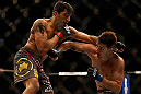 SAN JOSE, CA - APRIL 20:   (L-R) Ramsey Nijem punches Myles Jury in their lightweight bout during the UFC on FOX event during the UFC on FOX event at the HP Pavilion on April 20, 2013 in San Jose, California.  (Photo by Josh Hedges/Zuffa LLC/Zuffa LLC via Getty Images)  *** Local Caption *** Ramsey Nijem; Myles Jury