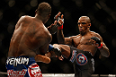 SAN JOSE, CA - APRIL 20:   (R-L) Francis Carmont kicks Lorenz Larkin in their middleweight bout during the UFC on FOX event during the UFC on FOX event at the HP Pavilion on April 20, 2013 in San Jose, California.  (Photo by Josh Hedges/Zuffa LLC/Zuffa LLC via Getty Images)  *** Local Caption *** Francis Carmont; Lorenz Larkin