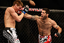 SAN JOSE, CA - APRIL 20:   (R-L) Matt Brown punches Jordan Mein in their welterweight bout during the UFC on FOX event during the UFC on FOX event at the HP Pavilion on April 20, 2013 in San Jose, California.  (Photo by Josh Hedges/Zuffa LLC/Zuffa LLC via Getty Images)  *** Local Caption *** Matt Brown; Jordan Mein